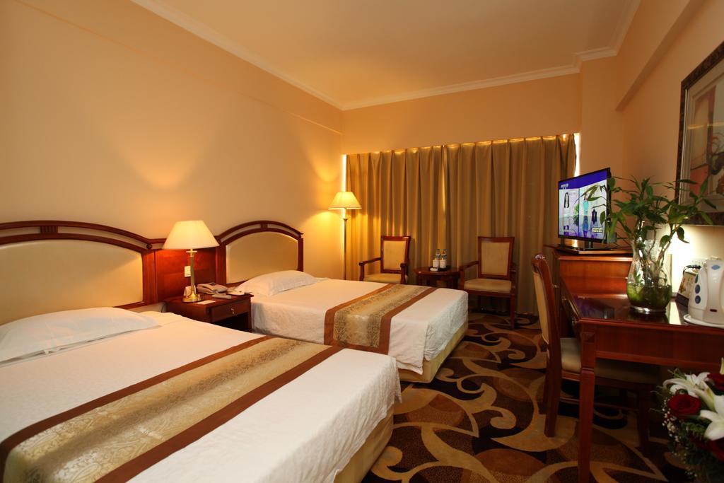 Milky Way Hotel Harbin Quarto foto
