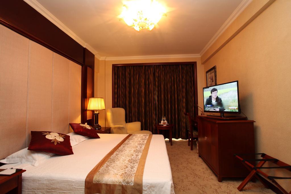 Milky Way Hotel Harbin Quarto foto