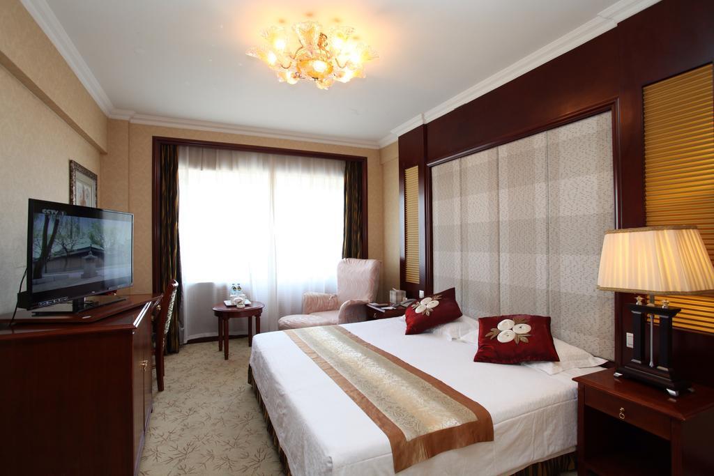 Milky Way Hotel Harbin Quarto foto
